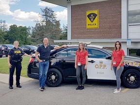 OPP detachments in Norfolk County and Haldimand County have teamed up with Community Addiction and Mental Health Services (CAMHS) to create an Addiction Mobile Outreach Team (AMOT). Team members will respond to community members with addiction issues in crisis. Members of the AMOT team include Lindsay Van Paassen (left), Haldimand County community mobilization officer, Jay Eberley, Norfolk County community mobilization officer, AMOT member Jacqueline Boniface, AMOT member Krystan Dimitropoulos, and Bobby Jo Smith, the local CAMHS clinical services manager. OPP photo