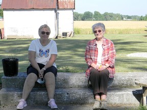 Agnes Frye (left) and Ariel Mann on the steps of Whitebread United Church, June 28, 2020. Photo by John Martinello.