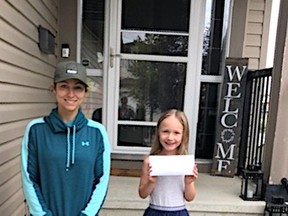 Grade 1 teacher Jackie Stern visits her student Londen Taylor before the start of the school year.
(Supplied)