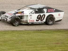 Hythe Motor Speedway president BJ Clark in his 2007 Alien chassis and 602 GM Chevy Crate Engiine race car at the Hythe Motor Speedway last weekend. Clark was participating in the 12th annual  IMCA Supernationals. Despite battling rain and cool temperatures, the 35 participants pushed through the elements to provide top-class entertainment for those with a vested interest in racing.