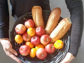 A basket of fruit and bread is displayed at an earlier Food for the Soul event. The Lighthouse Church in Stony Plain's newest outreach offers free food to those in need and has been running on the first and third Saturday of every month since June.