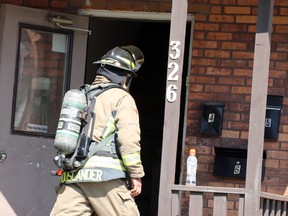 Firefighters respond to a call at 326 Albert St. W.., in Sault Ste. Marie, Ont., on Friday, Sept. 11, 2020. (BRIAN KELLY/THE SAULT STAR/POSTMEDIA NETWORK)