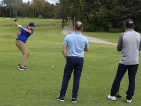 Kramyr Grenke, of Commerce Management Group, tees off during the 28th-annual Timmins Chamber of Commerce Golf Tournament at Spruce Needles Golf Club on Thursday. Due to COVID-19 restrictions, this year’s event was limited to 100 participants. ANDREW AUTIO/LOCAL JOURNALISM INITIATIVE