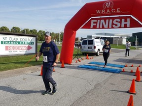 Mike Currie takes off during the start of the Law Enforcement Torch Run for Special Olympics Ontario on Saturday at St. Clair College Thames Campus. A virtual event was also held. (TREVOR TERFLOTH/The Daily News)