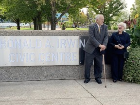 Sault Ste. Marie Mayor Christian Provenzano, unveils the lit sign marking the official dedication of the Ronald A. Irwin Civic Centre with Irwin, a former school board trustee, mayor and MP, with his wife Marg.  ELAINE DELLA-MATTIA