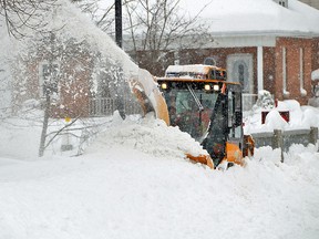 A sidewalk plow clears the walkway on the Jubilee Bridge in Owen Sound in February of this year. Pacific Ocean currents are in a La Nina pattern, and that may affect what kind of winter the area has in store. Rob Gowan/Sun Times file photo