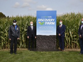 The company behind Canada's Outdoor Farm Show announced Tuesday it was planning to purchase a portion of the farm show lands. Picture, farm show president Doug Wagner, MPP Ernie Hardeman, Woodstock mayor Trevor Birtch and Ontario Federation of Agriculture president Keith Currie. (Kathleen Saylors/Woodstock Sentinel-Review)