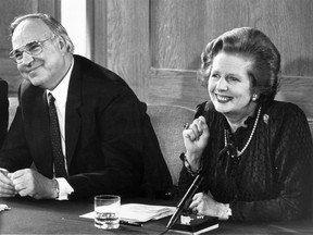 British prime minister Margaret Thatcher and her German counterpart, Helmut Kohl, at a press conference in London in April 1983. (Photo by Keystone/Getty Images)