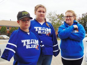 Photo by Helen Morley/For The Mid-North MonitorBlake Bond had some familial support from big sister Haileigh and mother Kayli at the NOFCC flag raising in 2019. Blake with the help of Councillor Heather Malott did the honours for the Town of Espanola.