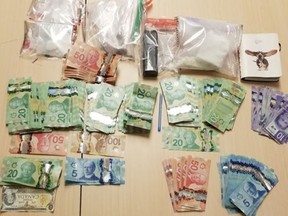 Drugs and money found by Kingston Police during a Sept. 11 arrest in Kingston. (Kingston Police/Supplied Photo)