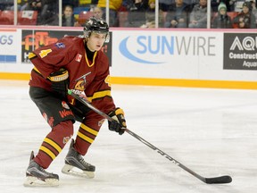 The Timmins Rock have traded blue-liner Aidan Milne, shown here in action during an NOJHL game against the Hearst Lumberjacks at the McIntyre Arena on Dec. 15, to the Elmira Sugar Kings, of the GOJHL. He will be reunited with goalie Vance Meyer, who was dealt to the Sugar Kings in July. FILE PHOTO/THE DAILY PRESS