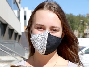 Audrey Vair holds a box of masks featuring her art designs to be donated to children in need. Photographed Thursday, Sept. 17, 2020 in Sault Ste. Marie, Ont. (BRIAN KELLY/THE SAULT STAR/POSTMEDIA NETWORK)