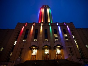 The tower at the Université de Montréal is lit up in Ça va bien aller colours. A study in June found 41 per cent of Quebecers were experiencing problematic levels of psychological distress.
