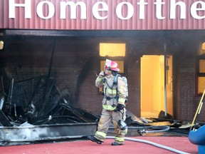 Rob Greve, of Sault Ste. Marie Fire Services, investigates fire at St. Paul Catholic elementary school, 78 Dablon St., in Sault Ste. Marie, Ont., on Tuesday, July 9, 2020.  (BRIAN KELLY/THE SAULT STAR/POSTMEDIA NETWORK)