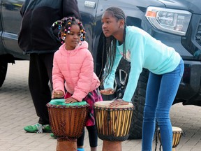 Amour Boty and Anais Laubouet join in the celebration, Sept. 19, at the launch of the Nipissing Culture Days at the North Bay and Area Museum.
PJ Wilson/The Nugget