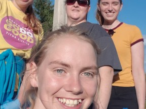 Pictured are Huron Perth Junior Farmers standing in front of a road sign before beginning the cleanup. From left in the back are Amanda Bos, Crystal Blake and Jolande Oudshoorn. In the front is Lauren Bos. Handout