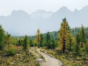 Larch Valley in Banff National Park reflects a hazy mountain horizon line due to wildfire smoke blown in from the U.S. last week, Sept.13. 2020. Photo Marie Conboy/ Postmedia.