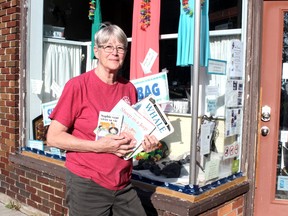 Pat Moulson, communications chair at the IODE, holds some of the books the organization will be giving out to teachers next week.
PJ Wilson/The Nugget