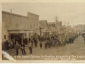 Armistice Day, Nov. 11, 1931, was a big day for Peace River, especially for the 360-plus school children, led by a pipe and drum band down Main Street to the Boyd Theatre. There, they were treated to a viewing of the Journeys End and a generous bag of candy, compliments the Canadian Legion. The presentation, according to an advertisement, was about glorifying not war, but human character. (74.593.001)