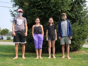 Students have been adjusting to the 'new normal' in schools since returning last week. From left are Juliusz, Mikayla, Roszie and Trisztyn Kowalski in Tillsonburg. (Chris Abbott/Norfolk and Tillsonburg News)