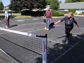 Anne Boyd, right, tried pickleball in Tillsonburg Saturday afternoon at Hickory Hills. (Chris Abbott/Norfolk Tillsonburg News)