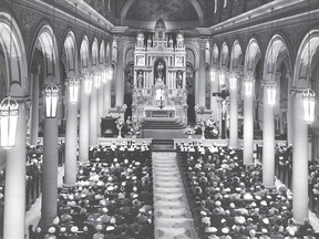 The Sunday, May 5, 1957 graduation ceremony of the Class of 1957 of the St. Joseph's Hospital School of Nursing at St Joseph's Church, Chatham. In the two front pews, dressed in their white nursing uniform, are the 15 graduates. Photo by Dolamore of Chatham; submitted by Helen Martinello