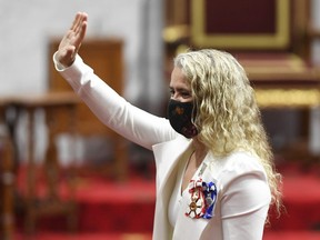Governor General Julie Payette gives a wave as she waits before delivering the throne speech in the Senate chamber in Ottawa on Sept. 23. ADRIAN WYLD /Canadian Press