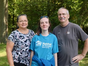 Sharon Cosby, Krysten Helka, and Russell Helka visited the Brook Street, Simcoe, property on Thursday to see where their Habitat for Humanity home will stand after its completion. (ASHLEY TAYLOR)