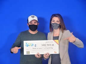 Shane and Laura Toms of North Bay won $245,723.10 in the Sept. 24 Lotto Max draw. The couple plans to use the money for their children's education. Supplied photo