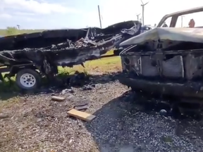 A pickup truck and boat were destroyed by fire at the corner of Highway 6 and Concession 2 of Woodhouse between 10:30 a.m. and 11:30 a.m. on Monday morning. (OPP PHOTO)