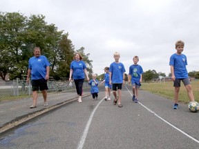 Greg and Anita D'Hulster, on the left, walked with five of their grandchildren in Tillsonburg for Sunday's annual Kidney Walk. Their Dyl-Pickles team raised more than $4,000. (Chris Abbott/Norfolk Tillsonburg News)