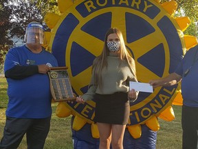 Lindsay Bettac was awarded the Terry Buchanan Scholarship, awarded to a recipient attending a technical or trade school. The scholarship was presented by Stew Hennig and Ted Griffiths. Photo Supplied.