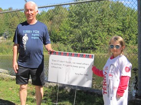 Bernie Reed, who helps organize the Hanover Terry Fox Run, along with his granddaughter, Claire, near the Hanover Community Trail. This year's event, which marked the 40-year anniversary of Fox's Marathon of Hope, was held on Sept. 20. Due to the ongoing COVID-19 pandemic, the event was held virtually, with no organized runs.