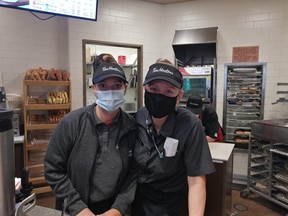 Andrea Lucas and Izzy Howe, employees at Kincardine's highway Tim Hortons, were excited to share the news that $7,767.20 was raised from the sales of their Smile Cookies. The money raised stays local, going towards the breakfast club. Hannah MacLeod/Kincardine News