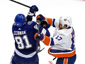 New York Islanders’ Matt Martin hits Tampa Bay Lightning’s Erik Cernak during the third period in Game 1 of the Eastern Conference final in the Stanley Cup playoffs at Rogers Place on Sept. 7, 2020, in Edmonton. (Bruce Bennett/Getty Images)