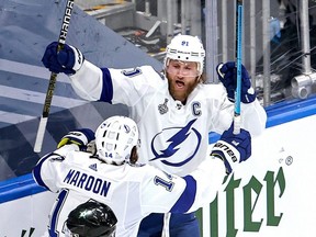 Steven Stamkos (91) of the Tampa Bay Lightning is congratulated by Pat Maroon after scoring a goal against the Dallas Stars during the first period in Game 3 of the 2020 NHL Stanley Cup final at Rogers Place on September 23, 2020, in Edmonton, Alberta. (Photo by Bruce Bennett/Getty Images)