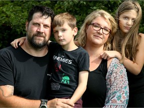 OTTAWA - Sept. 3, 2020 - Kim Moss and her husband Albert Porter (seen here with their two children Julius, 5, and Tilly, 8) are event industry workers who've been out of work since the pandemic started. The pair run Kamp Operations - an event management and security business - which saw bookings fall off a cliff in March.