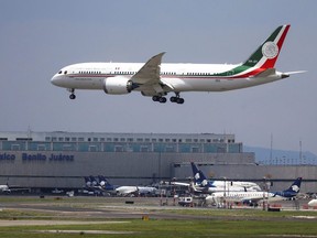 FILE PHOTO: Mexico's presidential plane, which President Andres Manuel Lopez Obrador is selling, lands at Benito Juarez international airport during its return from California, in Mexico City