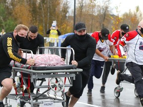 Teams race during the third annual Hospital Bed Races in support of the Northern Lights Health Foundation at Snye Point Park on Saturday, September 26, 2020. Sarah Williscraft/Fort McMurray Today/Postmedia Network