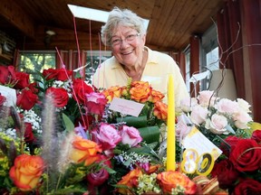 Bereavement companion Dixie Peters celebrates her 80th birthday with 80 roses from her clients in Morpeth, Ont., on Friday, Sept. 25, 2020. Mark Malone/Chatham Daily News/Postmedia Network