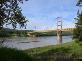 The Dunvegan Bridge spans the Peace River south of Fairview, Alta. on Saturday, July 11, 2020.