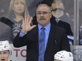 Then Ottawa Senators coach Paul MacLean argues for a penalty during a game against the Winnipeg Jets on March 8, 2014.