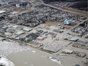 Flooded sections of downtown Fort McMurray as seen from the air on Monday, April 27, 2020. Supplied Image/McMurray Aviation ORG XMIT: POS2004291306036011