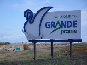 An entrance sign for Grande Prairie just west of the municipality along Highway 43 on Saturday, Sept. 26, 2020.
