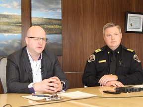 Mayor Don Scott sits with Regional Fire Chief Jody Butz during a press conference at the Jubilee Centre in Fort McMurray, Alta. On May 3, 2018. Vincent McDermott/Fort McMurray Today/Postmedia Network
