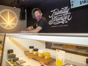 Zac Stormroy is a sales associate at Friendly Stranger Cannabis Culture Shop in London. (Derek Ruttan/The London Free Press)