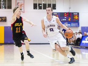 Max Allin, right, of Chatham, Ont., is a 2020 inductee into the Wilfrid Laurier University Golden Hawk Hall of Fame. (Trevor Mahoney/Laurier Golden Hawks)