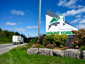 Mount Forest, Simply Explore signs erected this week replace the more controversial "High, Healthy, Happy" tagline used for years. (For The Sun Times/Postmedia)