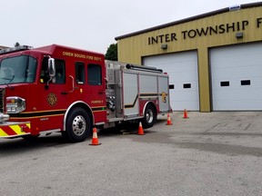 Owen Sound firefighters sit in a city truck outside the Inter Township fire hall Wednesday, Sept. 9, 2020. (Scott Dunn/The Sun Times/Postmedia Network)