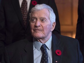 Former prime minister John Turner looks on during a photo op to mark the 150th anniversary of the first meeting of the first Parliament of Canada, in Ottawa on Monday, Nov. 6, 2017. Turner, dubbed "Canada's Kennedy" when he first arrived in Ottawa in the 1960s, has died at the age of 91. THE CANADIAN PRESS/Justin Tang